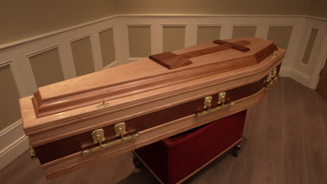 elegant wooden coffin on display