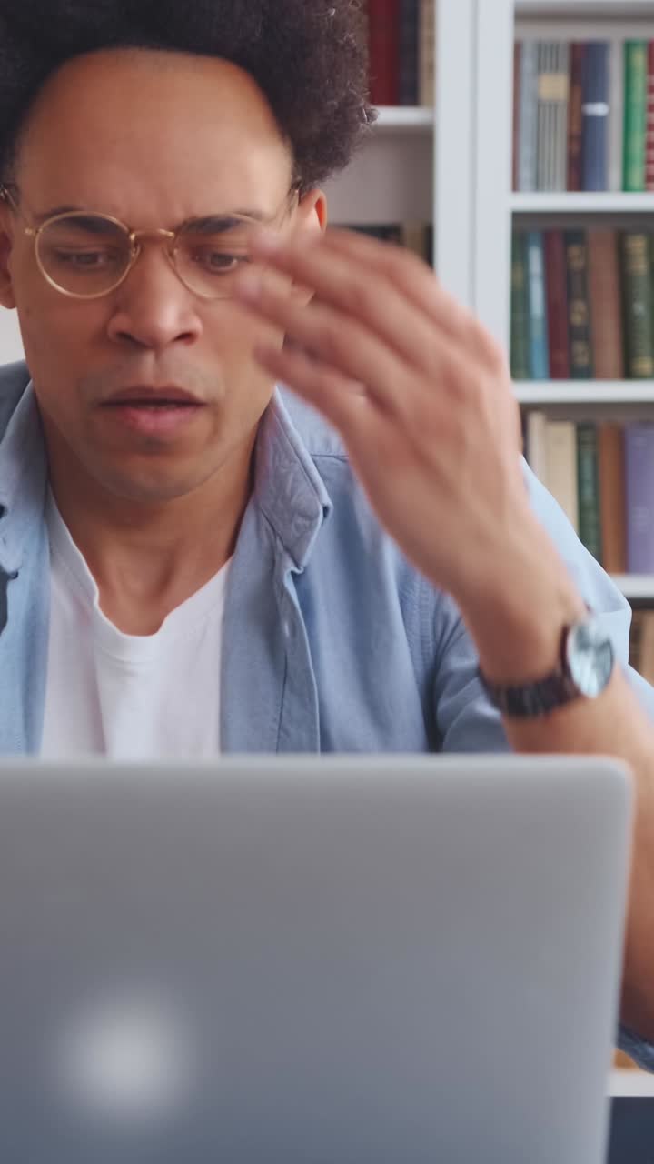 Feeling shocked while using a laptop at home during the day