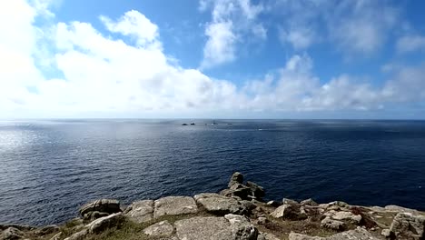 a vew of the ocean from atop a coastal cliff