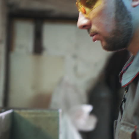 industrial worker works at a metallurgical plant. modern equipment for metal cutting. square video