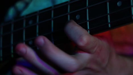 Bass-playing-close-up-with-flashing-lights