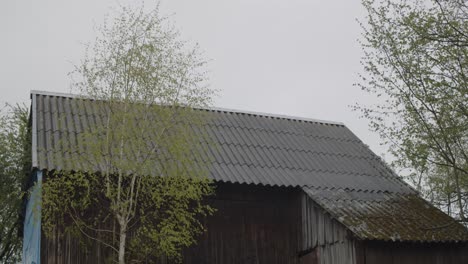 old farm barn asbestos roof strong wind