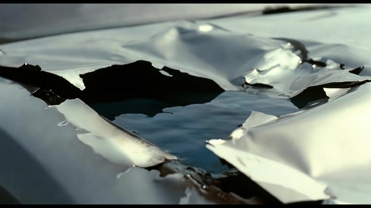 Water Pooling in Damaged Car Hood