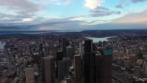 ultra wide aerial perspective of seattle's skyscrapers with lake union off in the distance