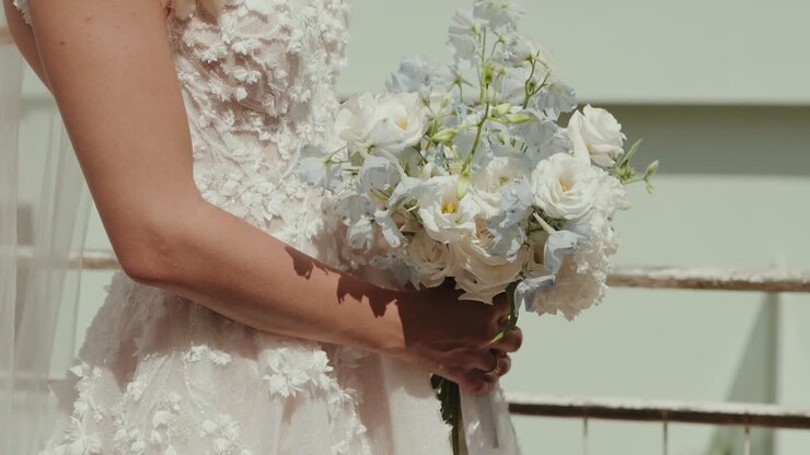 close up of bride bouquet with white flowers