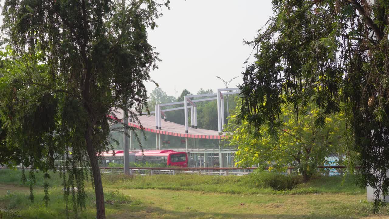 Red Bus at Modern Bus Stop in India