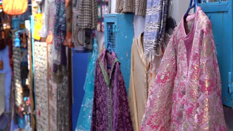 local clothes sold in the streets of the medina in chefchaouen, morocco