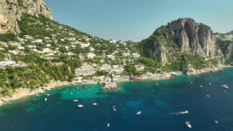 high level drone approaching spiaggia di marina on the italian island of capri