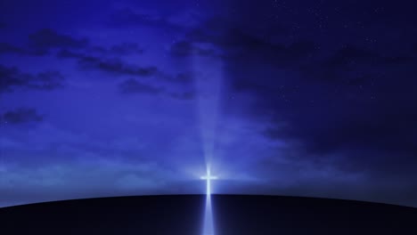 bright cross on the hill with clouds moving on blue starry sky