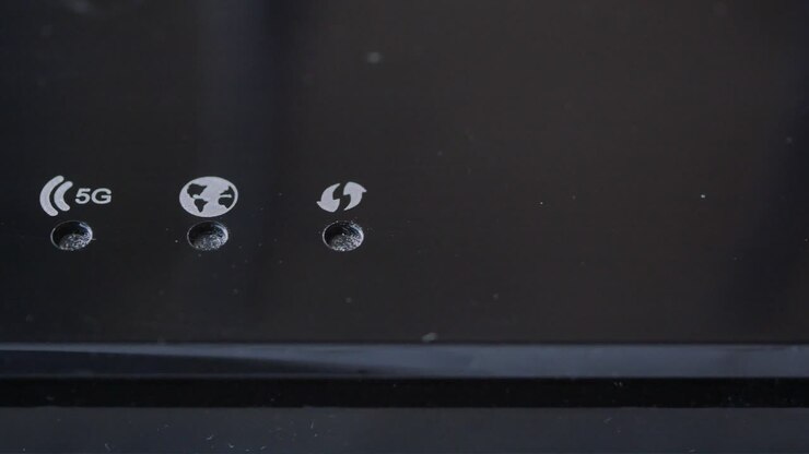 Close-up of a Wireless Router with Connectivity Symbols