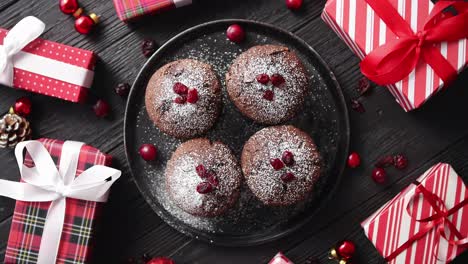 Christmas-chocolate-delicious-muffins-served-on-black-ceramic-plate