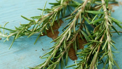 rosemary on wooden table 4k