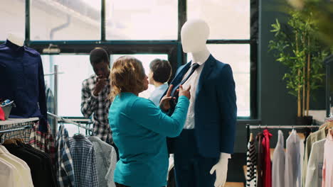 Woman-checking-blue-suit