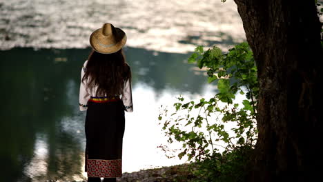 romanian girl walks through the forest 1