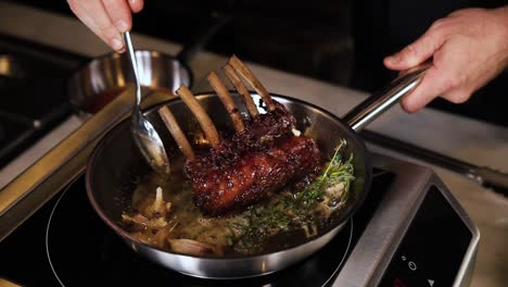 chef preparing roasted lamb ribs