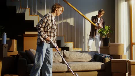 couple moving and cleaning their new home