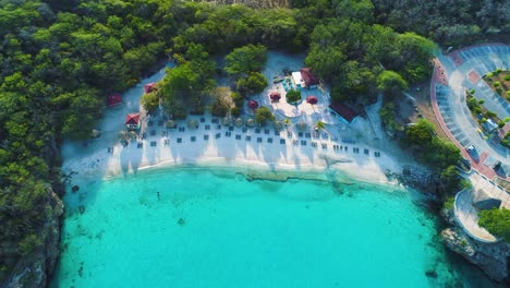 Drone-bird's-eye-view-left-to-right-pan-across-Grote-Knip-beach-Curacao-at-sunrise