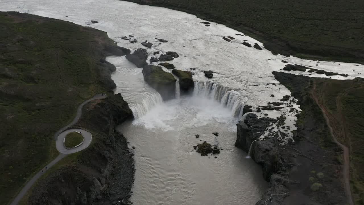 Famous Godafoss waterfall in Iceland on cloudy day in nordic landscape