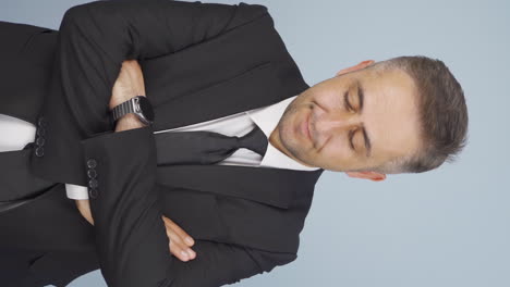 Vertical-video-of-Depressed-businessman.