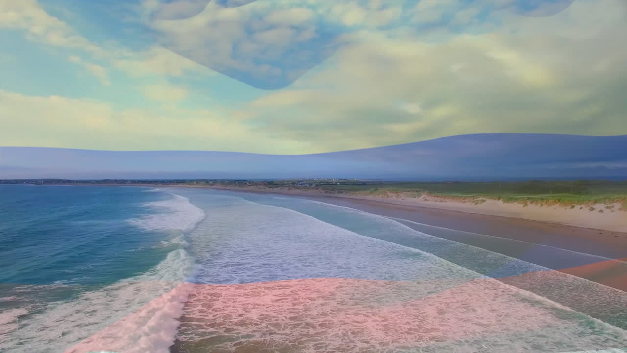 анимация флага колумбии, развевающегося над солнечным пляжем и волнами в море