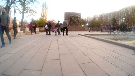 memorial to turkish warriors passersby walks fountain marketplace ankara