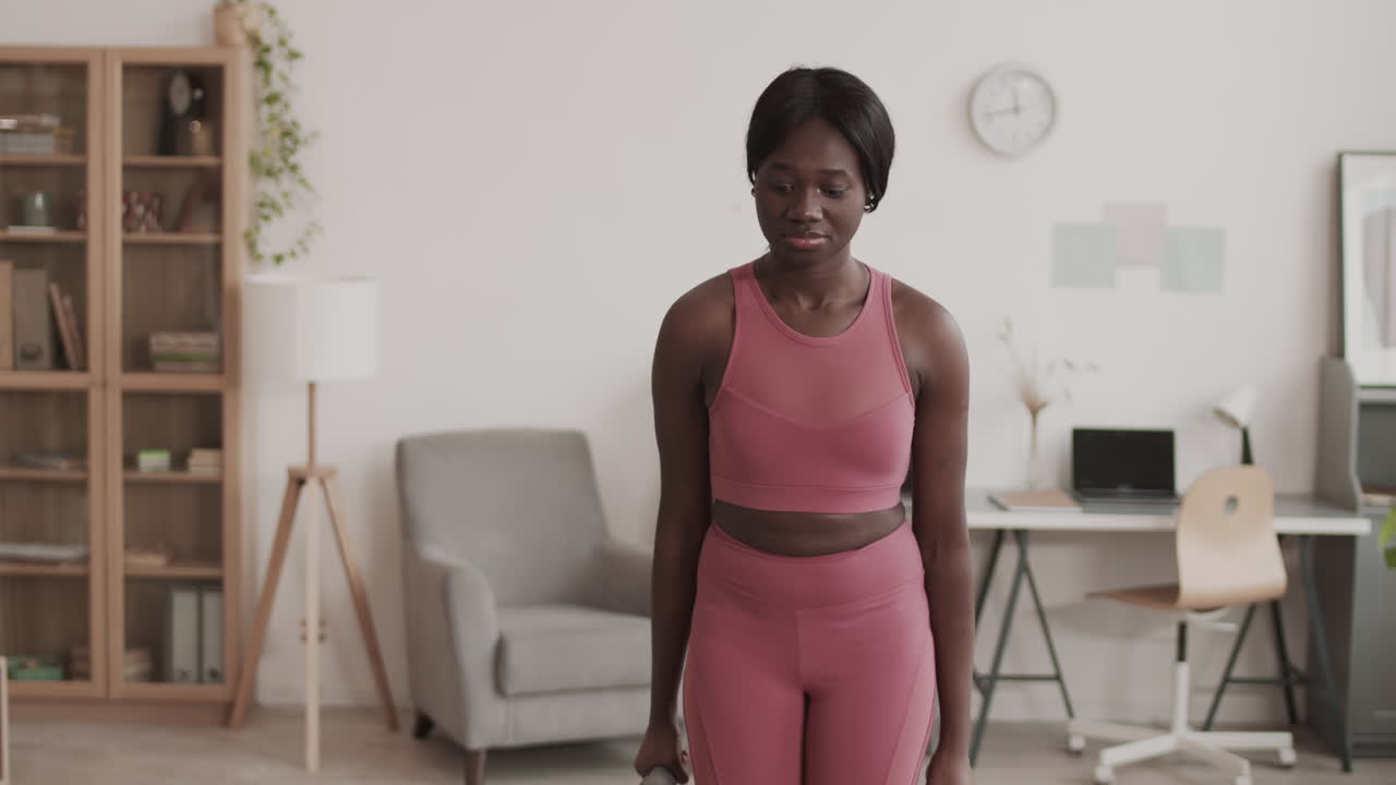 Beautiful African Sportswoman Having Training at Home