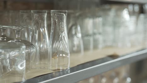 Close-up-shot-of-empty-clean-glasses-in-a-bar