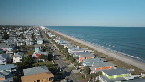 aerial orbiting over housing property kure beach 4k