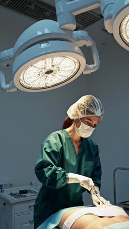 surgeon performing a procedure in an operating room