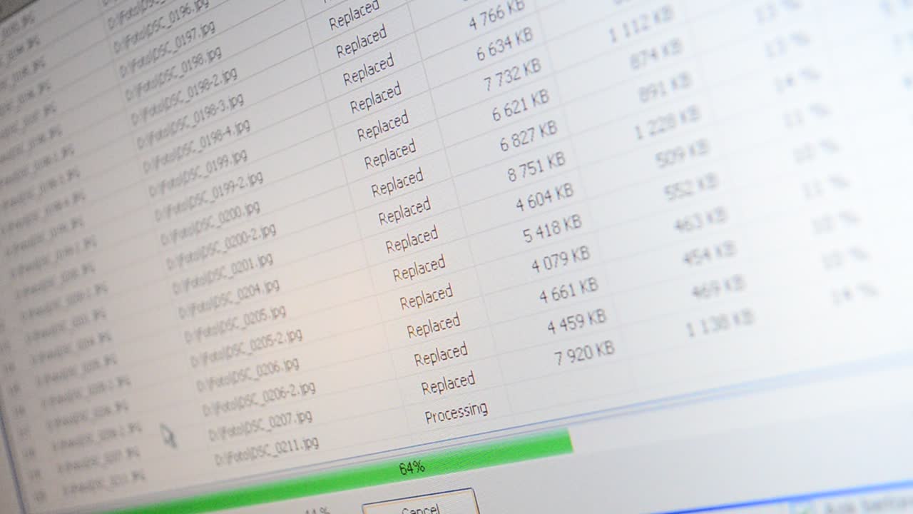 Resource-intensive operation on coding. Processing when coding jpg. Process of coding of the file on a computer screen