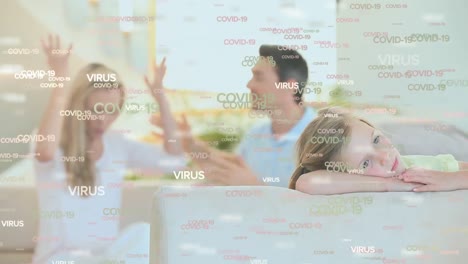 Digital-composite-video-of-covid-19-text-and-cells-moving-against-family-having-a-fight