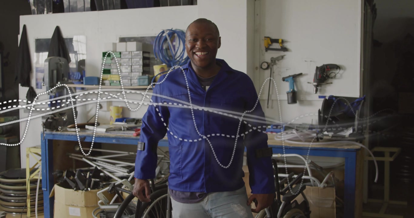 Workshop technician speaking and laughing, causing waveform sweeping, pulsing and smoothing