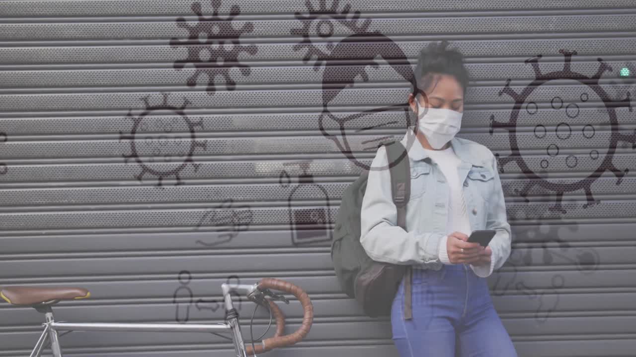 Coronavirus concept icons against woman wearing face mask using smartphone