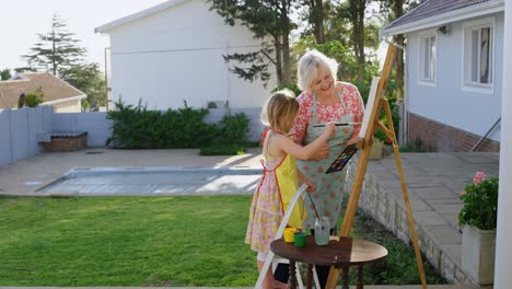 daughter and grandmother painting on canvas 4k