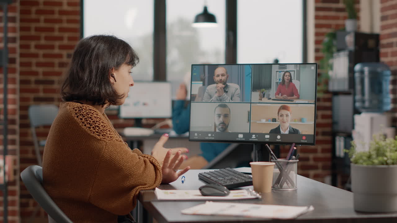 Woman on a video call with colleagues