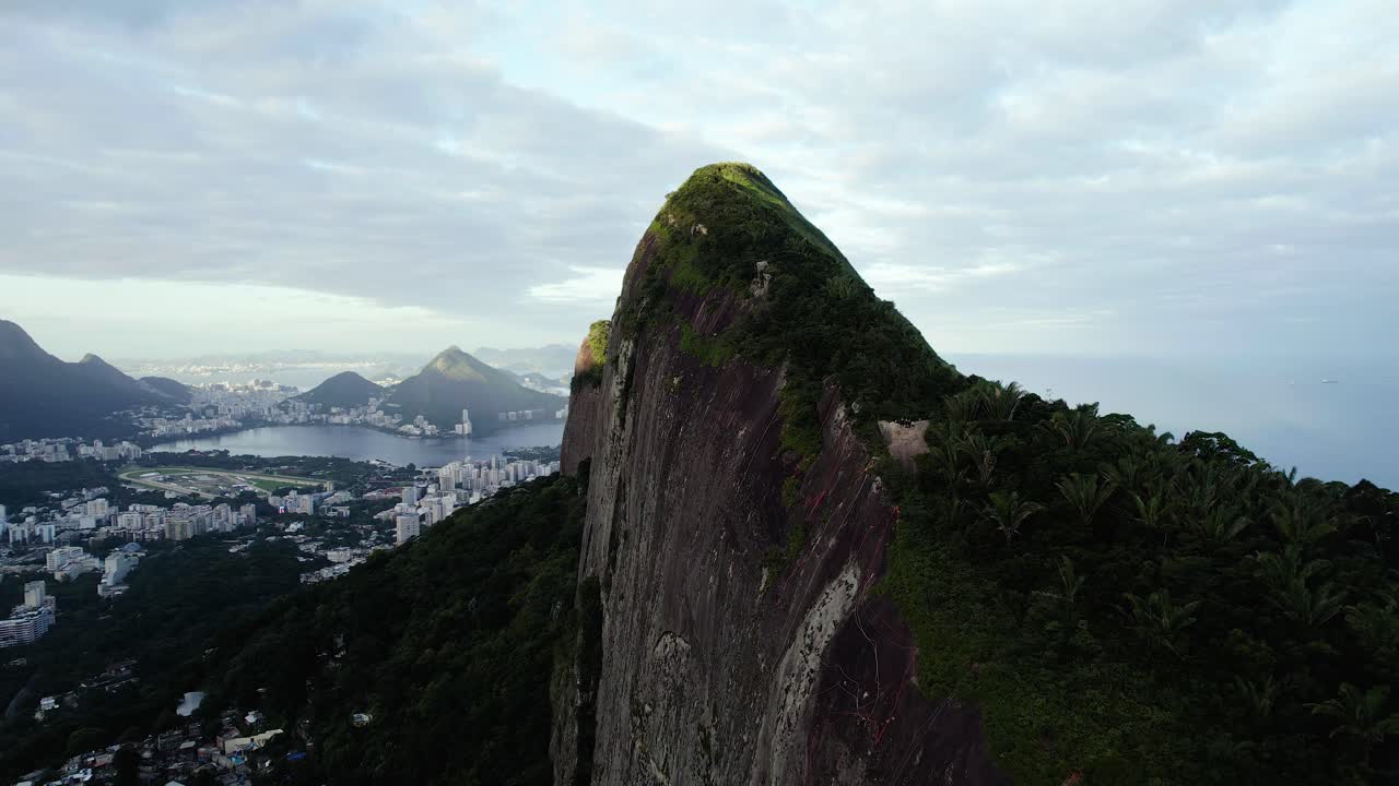 Aerial view rising along the Don Irmaos mountain, sunset in Rio de Janeiro
