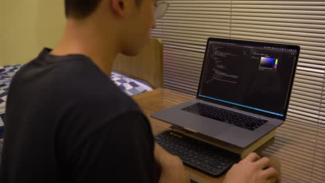 work from home programmer creates landing page with visual studio code