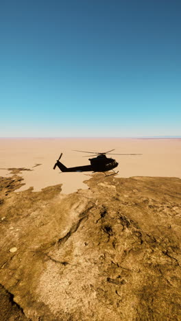 helicopter flying over the desert