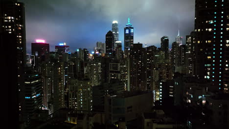a view of a city at night from the top of a building