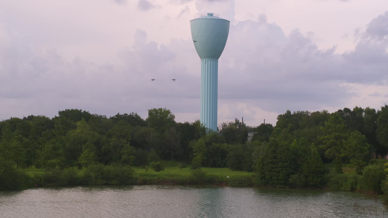 Iconic Light Blue Water Tower Over Brays Bayou in Southwest Houston – Drone Shot