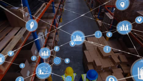 animation of network of locator and data icons over diverse workers at goods warehouse