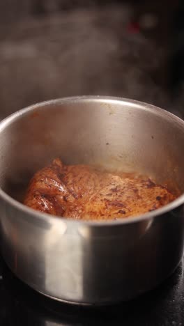 cooking chicken in a pot