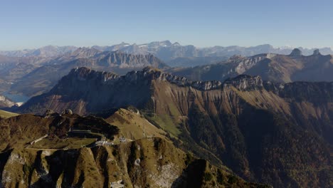 high aerial orbit around summit in the swiss prealps