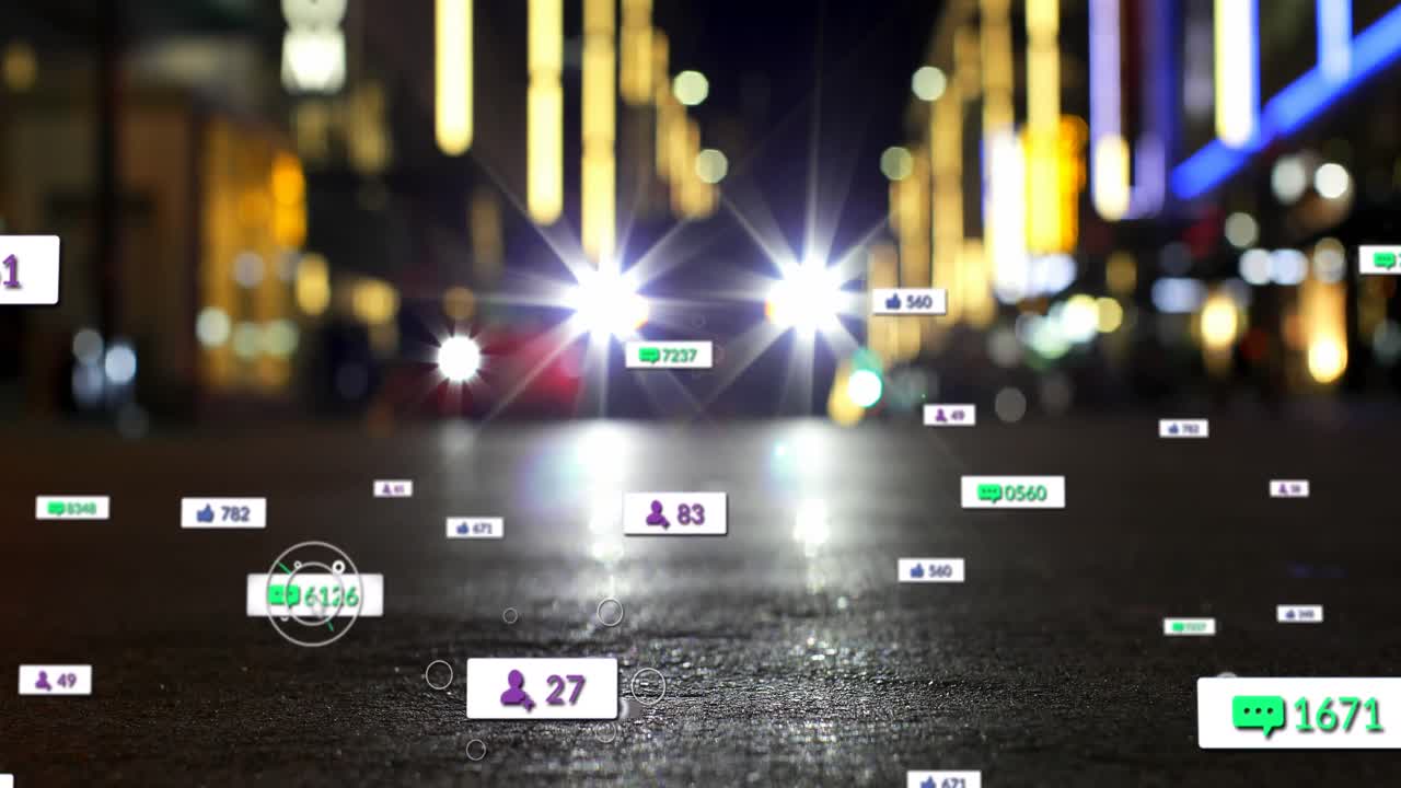 Animation of social media icons and numbers over out of focus city and traffic lights
