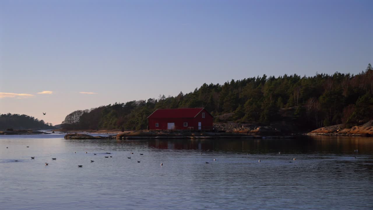 Sandefjord Nötholmens Naturreservat Strömstad Marina Red building seagull birds coastal seaside town Stromstad Sweden Sverige ferry boat ride Norge Scandinavia arctic golden hour sunset coastline