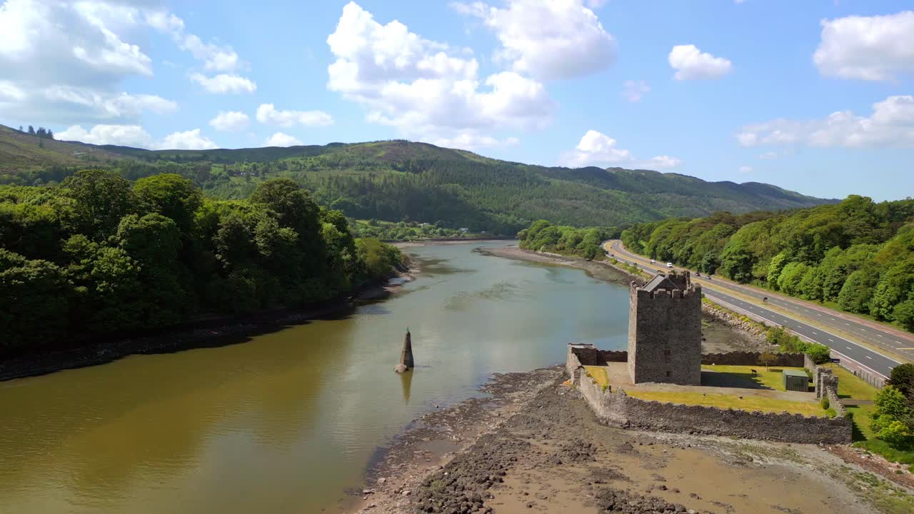 Advancing and descending aerial video of Narrow Water Keep in Warrenpoint, County Down, Northern Ireland, UK on a bright and sunny day. Filmed in 4K, 60FPS and with Rec709 color.
