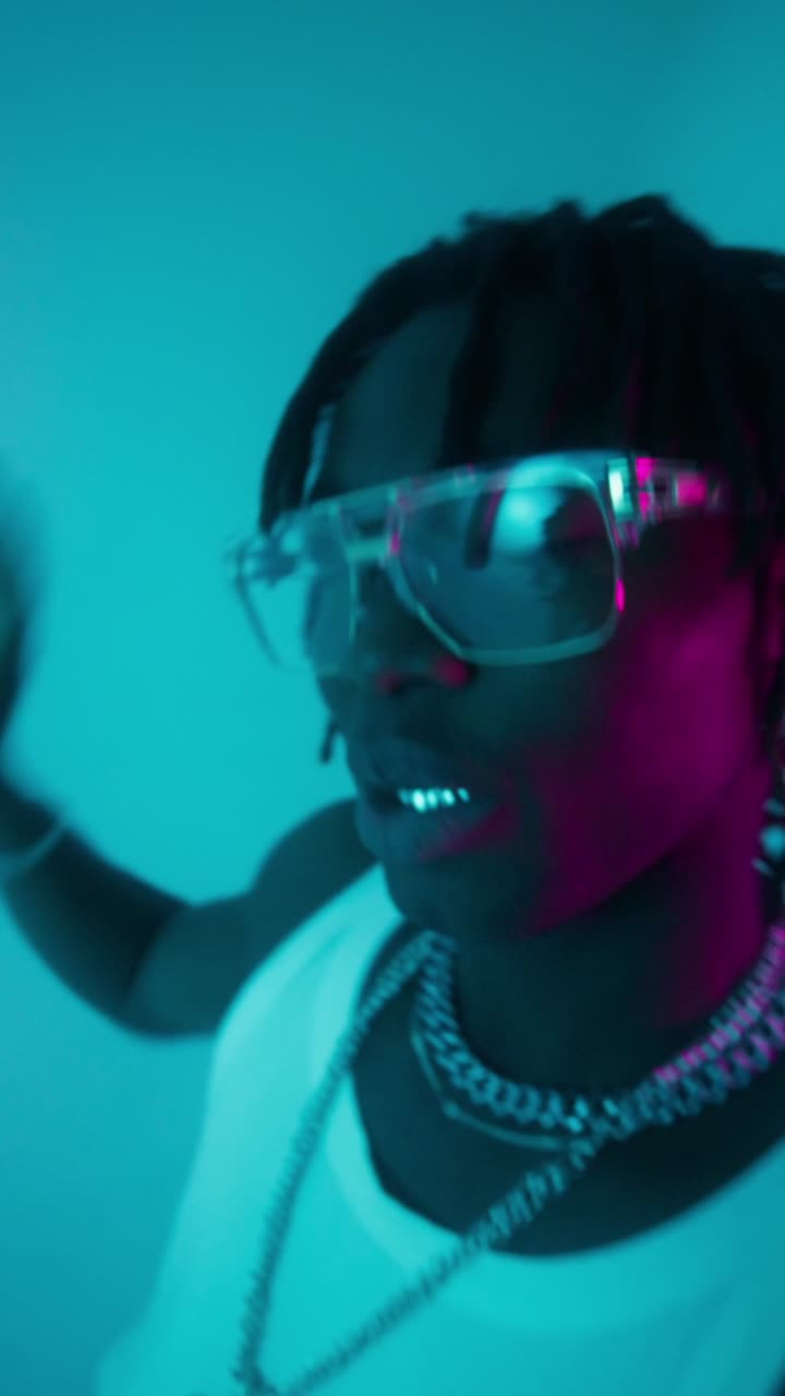 Portrait of a Rapper in Neon Lighting