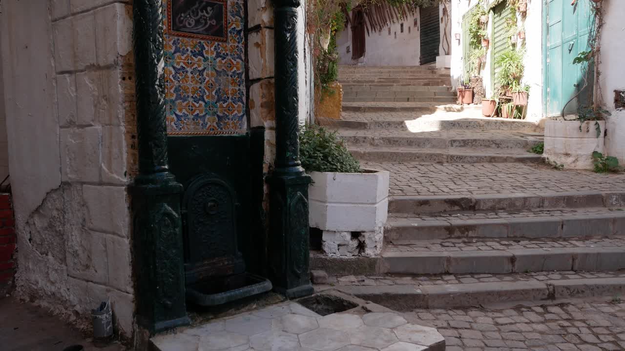 Tilt down shot of a Fountain in the kasbah of Algiers