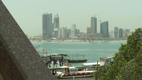 a view of the diplomatic area in manama, bahrain shot from the alghous fishing port in muharraq