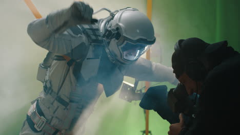 astronaut action scene filming on green screen